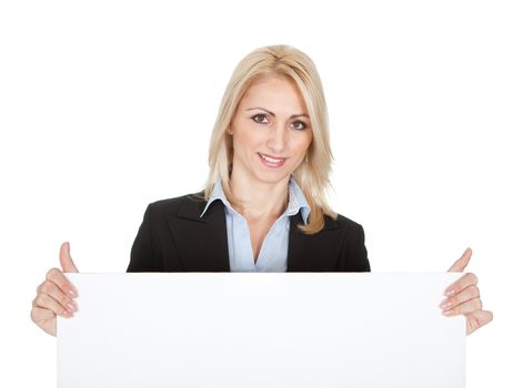 Cheerful businesswomen presenting empty board. Isolated on white