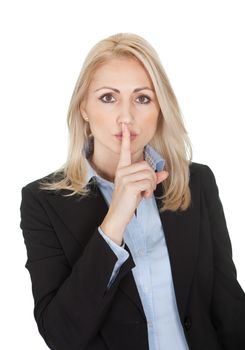 Beautiful business woman making a silence gesture. Isolated on white