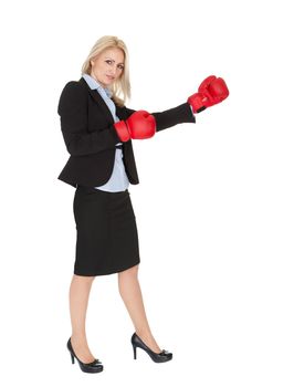 Beautiful businesswomen doing a punch. Isolated on white