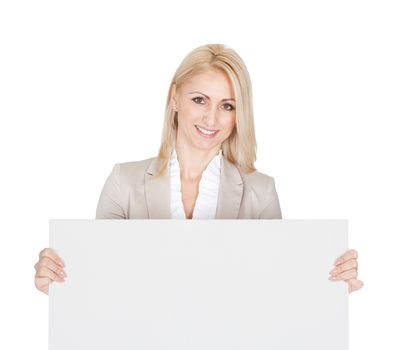 Cheerful businesswomen presenting empty board. Isolated on white