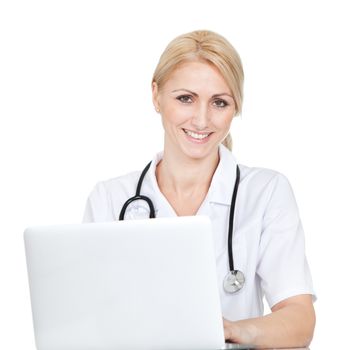 Medical doctor working on laptop. Isolated on white