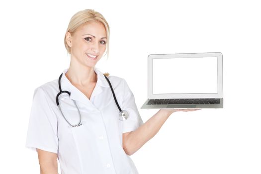 Smiling medical doctor woman presenting laptop. Isolated on white