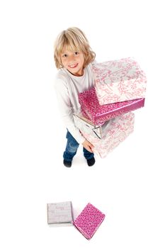 a little boy with a lot of presents on a white background