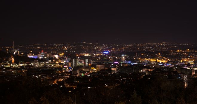 STUTTGART, GERMANY - NOVEMBER 9, 2013: Stuttgart panorama at night as seen from the western areas of the city on November 9, 2013 in Stuttgart, Germany. The Wilhelm-Charlotten platform was renovated in 2012 and offers a great view over the city by day and especially by night.