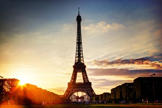 Eiffel Tower seen from Champ de Mars at sunset, Paris, France