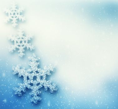 Winter, Christmas background with big snowflakes, snow storm, frost, glittering lights. 