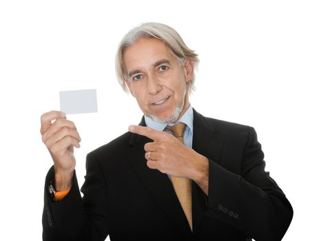 Portrait of mature male executive showing a empty business card on white background.