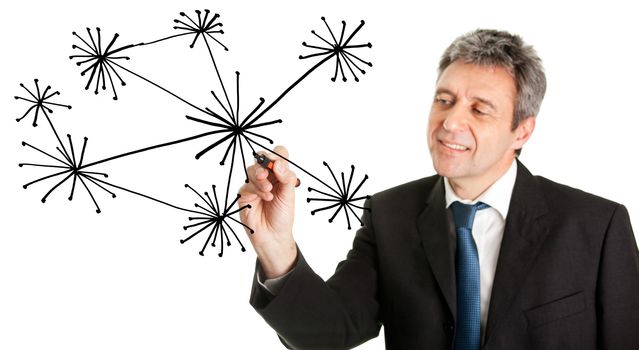 Businessman drawing a social network graph. Isolated on white