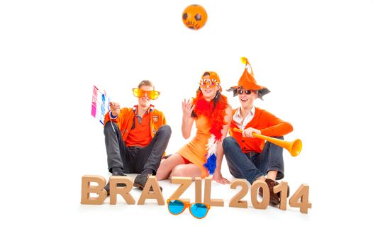 two boys and a girl, the supporters of the dutch soccerteam.