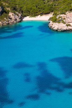 Cala Macarelleta in Ciutadella Menorca at turquoise Balearic Islands Mediterranean sea