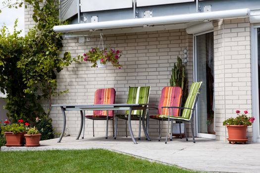 Image of sitting area in front yard of house