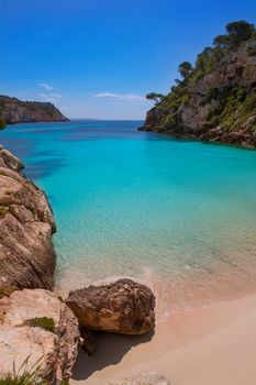 Cala Macarelleta in Ciutadella Menorca at turquoise Balearic Islands Mediterranean sea