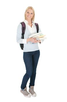 Portrait of beautiful student girl with books. Isolated on white