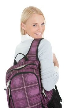 Portrait of beautiful student girl with backpack. Isolated on white