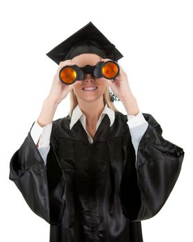Student in graduation gown looking through binoculars. Isolated on white