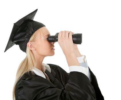 Student in graduation gown looking through binoculars. Isolated on white