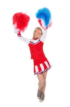 Smiling beautiful cheerleader with pompoms. Isolated on white