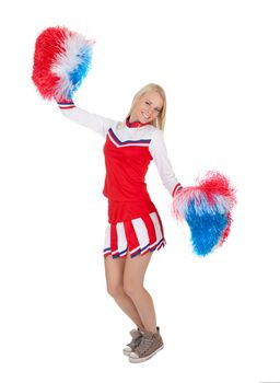 Smiling beautiful cheerleader with pompoms. Isolated on white