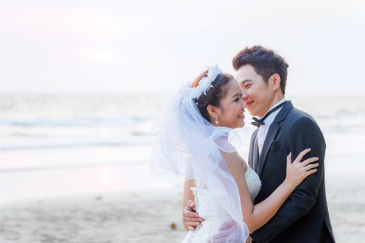 Happy Young Adult Couples in love at beach