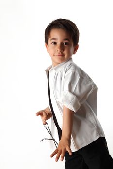 male child playing with rosary for pray