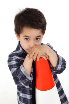 Young boy in studio with safety road signal