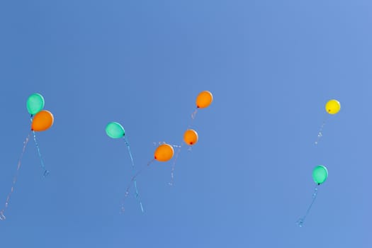 color balloons flying to the sky