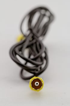 only yellow video RCA cable on a white background