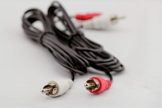 Left-right audio RCA cable on a white background (red white)