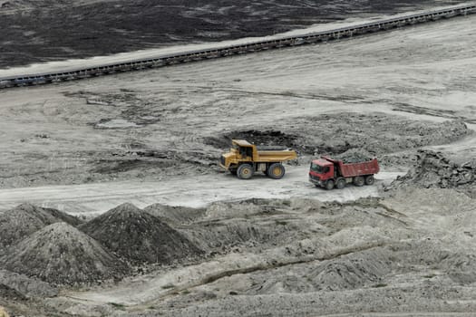 huge truck on a coal mine open pit