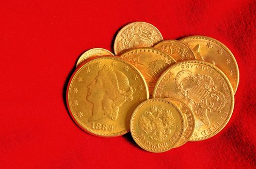 Golden coins from the end of nineteenth century. Rubels, dollars, swiss and french francs.
