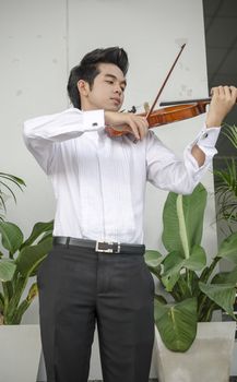 Thailand asia man with his violin he is a soloist