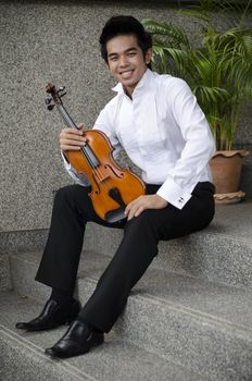 Thailand asia man with his violin he is a soloist