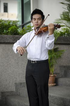 Thailand asia man with his violin he is a soloist