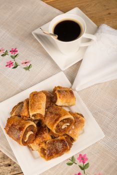 Homemade pumpkin biscuits served with a cup of coffee