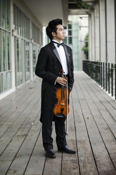 Thailand asia man with his violin he is a soloist