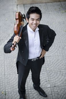 Thailand asia man with his violin he is a soloist