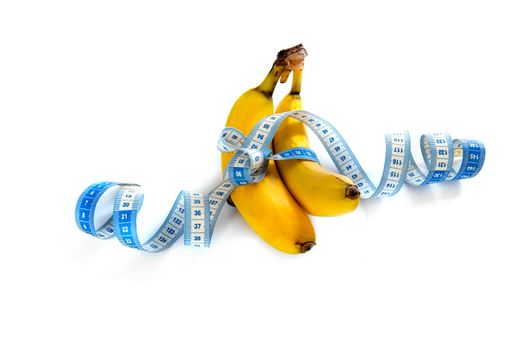 a banana with a tape-measure on a white background