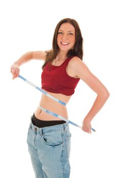 a girl with a measure tape, celebrating her success of loosing weight