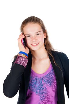 a beautiful young and modern girl with her mobile phone on a white background