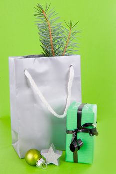 Christmas presents in green on a white background