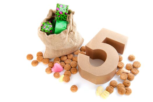 A jute bag with gingernuts, for celebrating the dutch holiday " sinterklaas " on the fifth of December