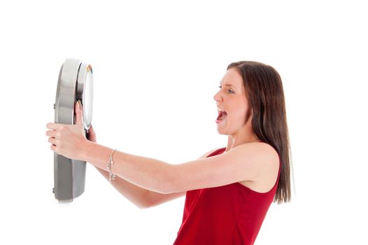 a angry girl with a weighing scale, on a white background