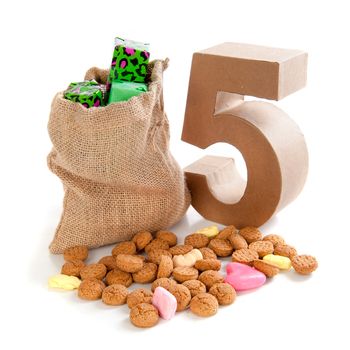 A jute bag with gingernuts, for celebrating the dutch holiday " sinterklaas " on the fifth of December