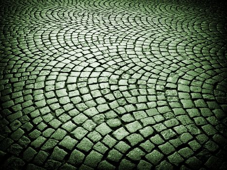Beautiful old urban cobblestone paved street in France.