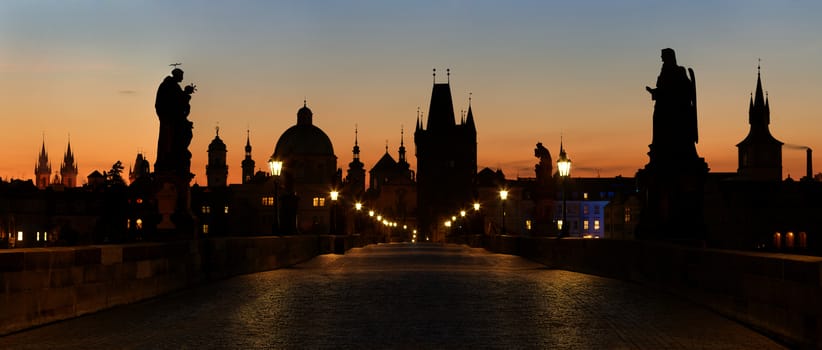 panoramic view of Charles Bridge before dawn, Prague, Czech Republic