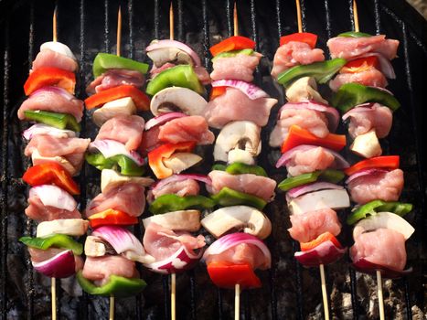 Barbecue skewers with pork and vegetables