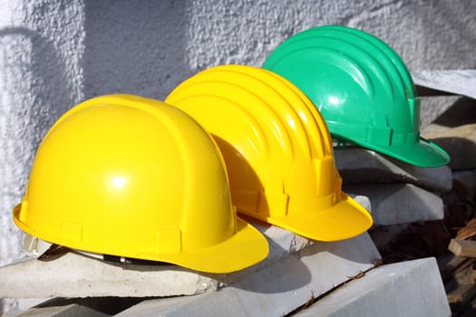 Some helmets close up on work place 