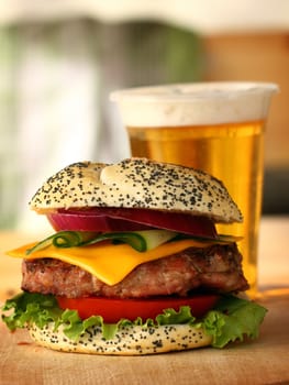 Close up of big tasty burger and beer 