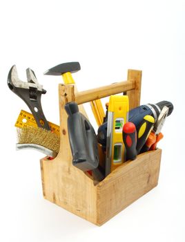 wooden tool box at work on a white background 