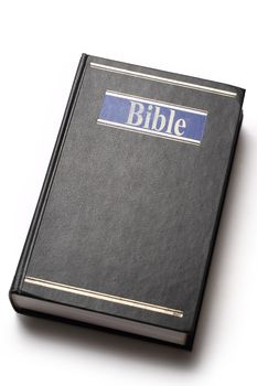 Black Bible book on white background